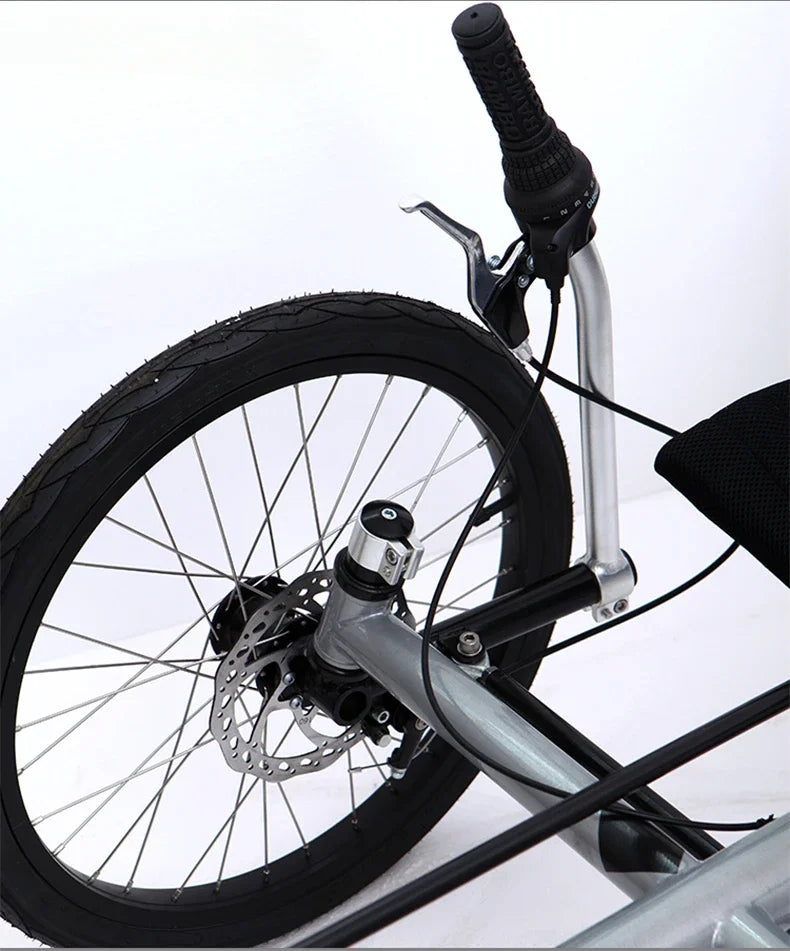 Lying on a tricycle, 3 shifting disc brakes, folding on a recumbent bike, casual commuting, riding a recumbent bicycle