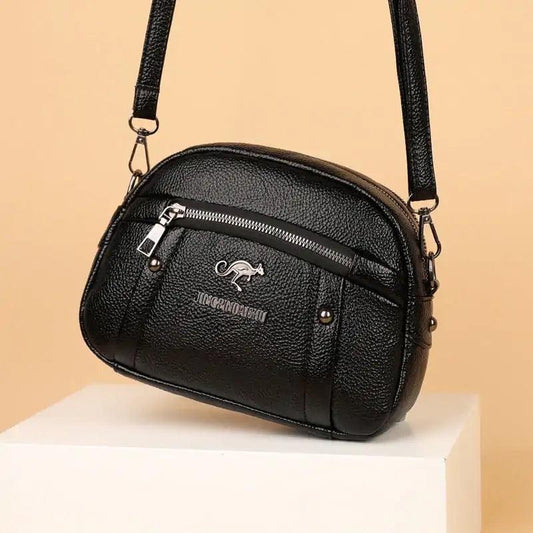 Chic Leather Circle Purse - MANDOTOS